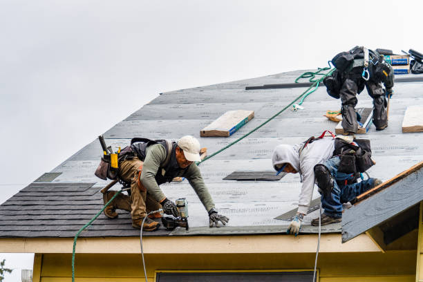 Professional Gutter Installation technician working in Orange, MA